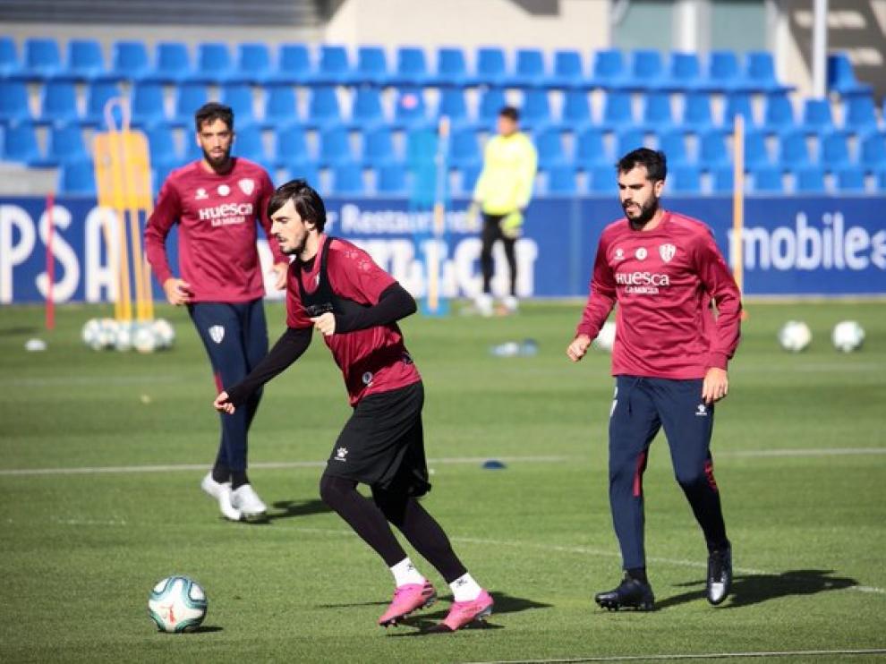 Eugeni y Pablo Insua, en el entrenamiento de este miércoles en El Alcoraz.