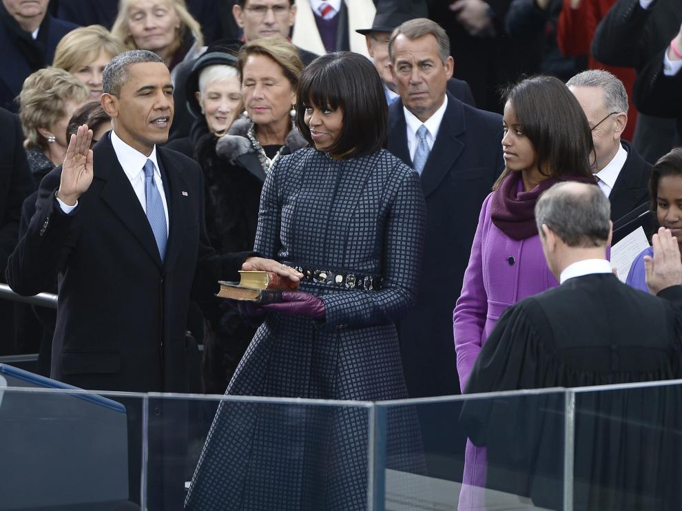 Michelle Obama, con un abrigo de Thom Browne, en la toma de posesión de su marido como presidente de los Estados Unidos en 2013