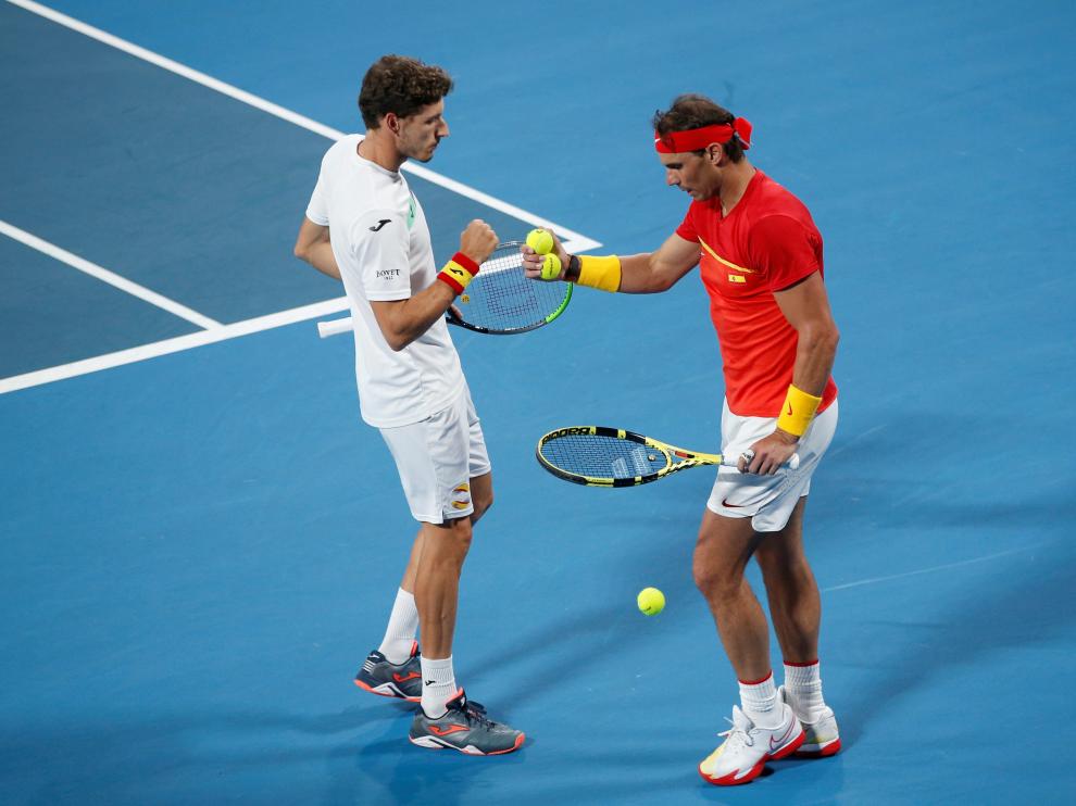 Rafa Nadal y Pablo Carreño, en su partido contra Bélgica.
