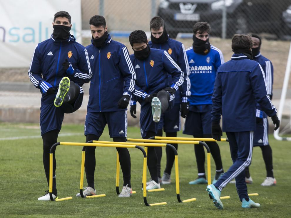 Grippo, Pereira, Kagawa, Vigaray, Francés, Igbekeme y Delmás, durante el entrenamiento de ayer en la Ciudad Deportiva.