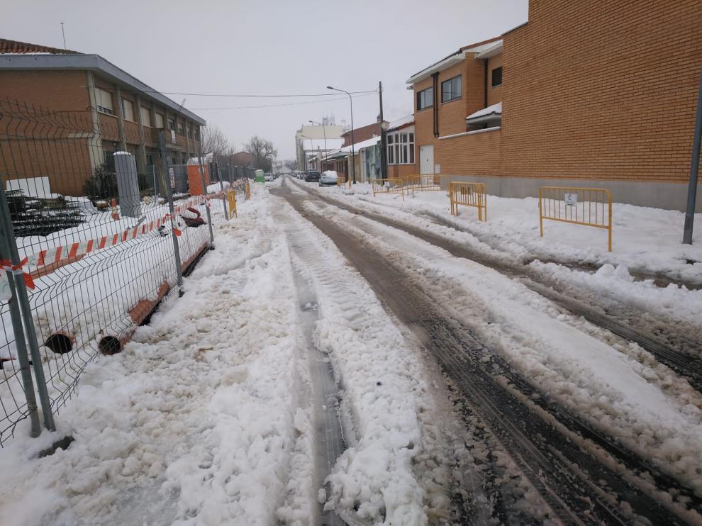 Una calle céntrica de Cariñena, esta mañana cuando no había casi circulación por la nevada.