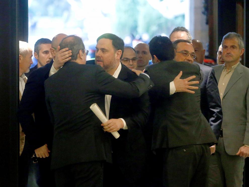 Los exconsejeros presos, en el Parlament