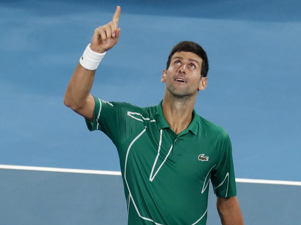 Melbourne (Australia), 30/01/2020.- Novak Djokovic of Serbia reacts after winning his men's singles semifinal match against Roger Federer of Switzerland at the Australian Open Grand Slam tennis tournament in Melbourne, Australia, 30 January 2020. (Tenis, Abierto, Suiza) EFE/EPA/ROMAN PILIPEY Tennis Australian Open 2020