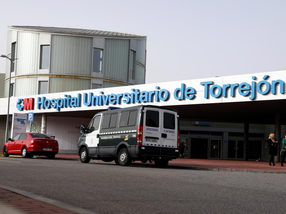 A Spanish civil guard van is seen outside Torrejon University Hospital after two coronavirus cases were identified in Torrejon de Ardoz