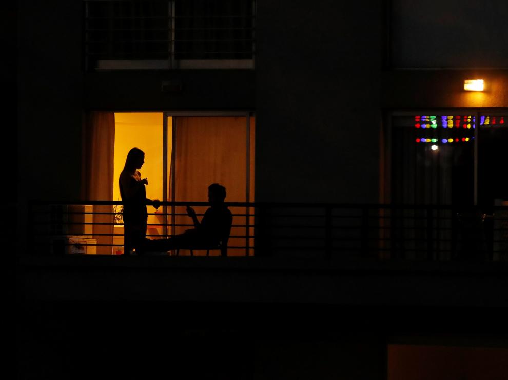 People join a citywide applause as people clap from their balconies and windows to show appreciation and support for the health workers as the spread of the coronavirus disease (COVID-19) continues, in Buenos Aires