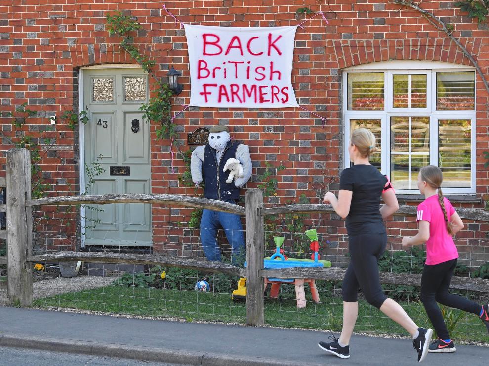 Scarecrows representing key workers lighten the daily lockdown walk, as the number of the coronavirus disease cases (COVID-19) grows around the world, in the village of Capel