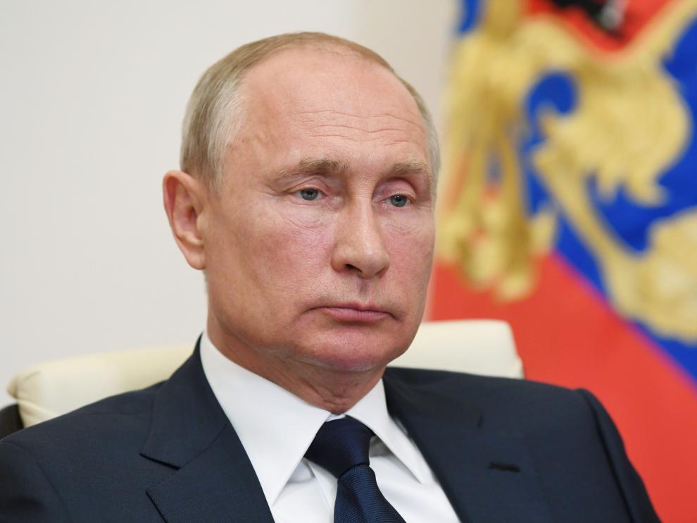 Russian President Putin delivers a televised address to the nation about the coronavirus disease outbreak, outside Moscow