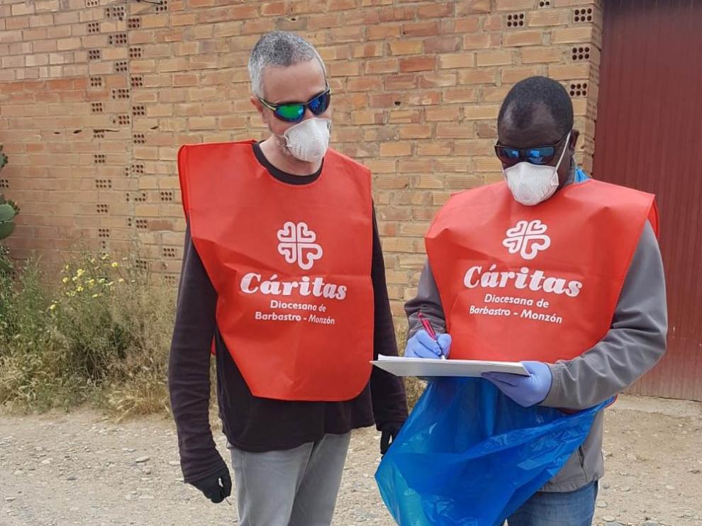 Juan Rico y N’Goro Coulibaly, trabajadores de Cáritas Diocesana de Barbastro-Monzón