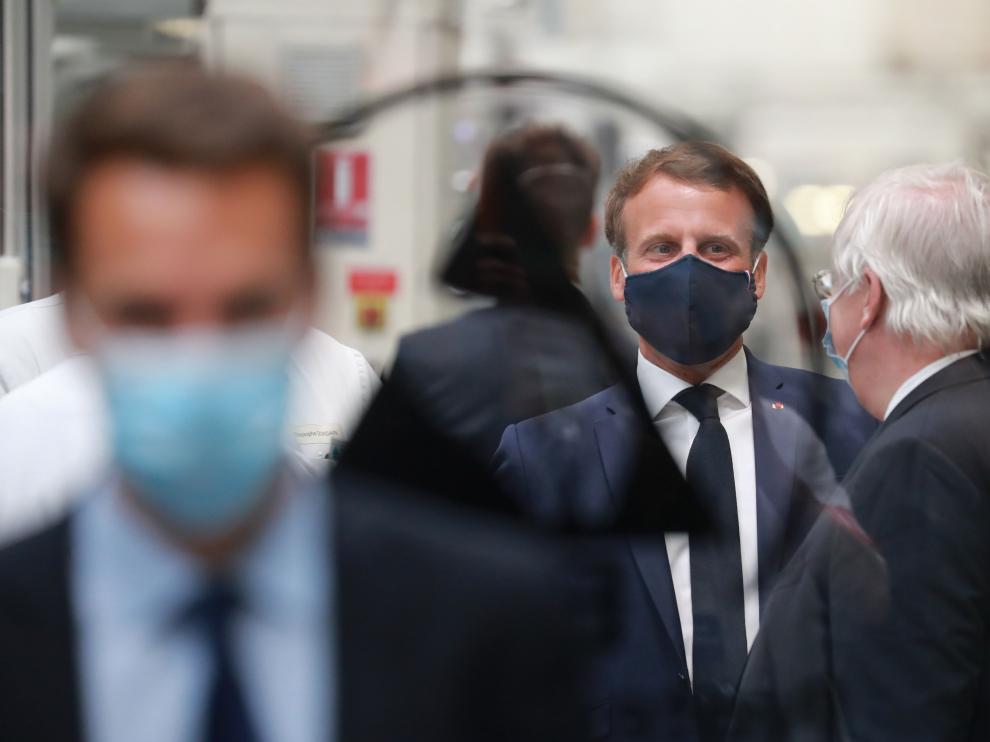 French President Emmanuel Macron visits a factory of automotive manufacturer Valeo in Etaples