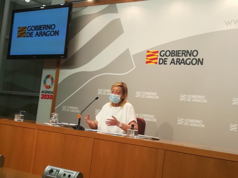 Marta Gastón, consejera de Economía del Gobierno aragonés en la presentación de las ayudas en el edificio Pignatelli.