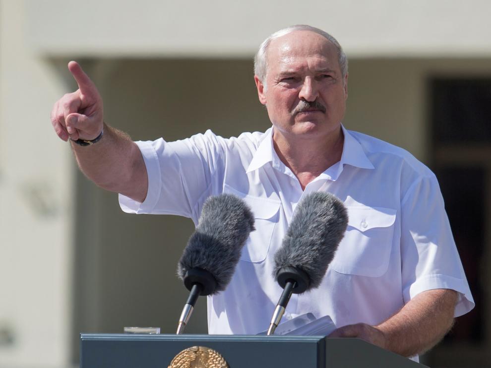 Belarusian President Lukashenko delivers a speech during a rally of his supporters in Minsk