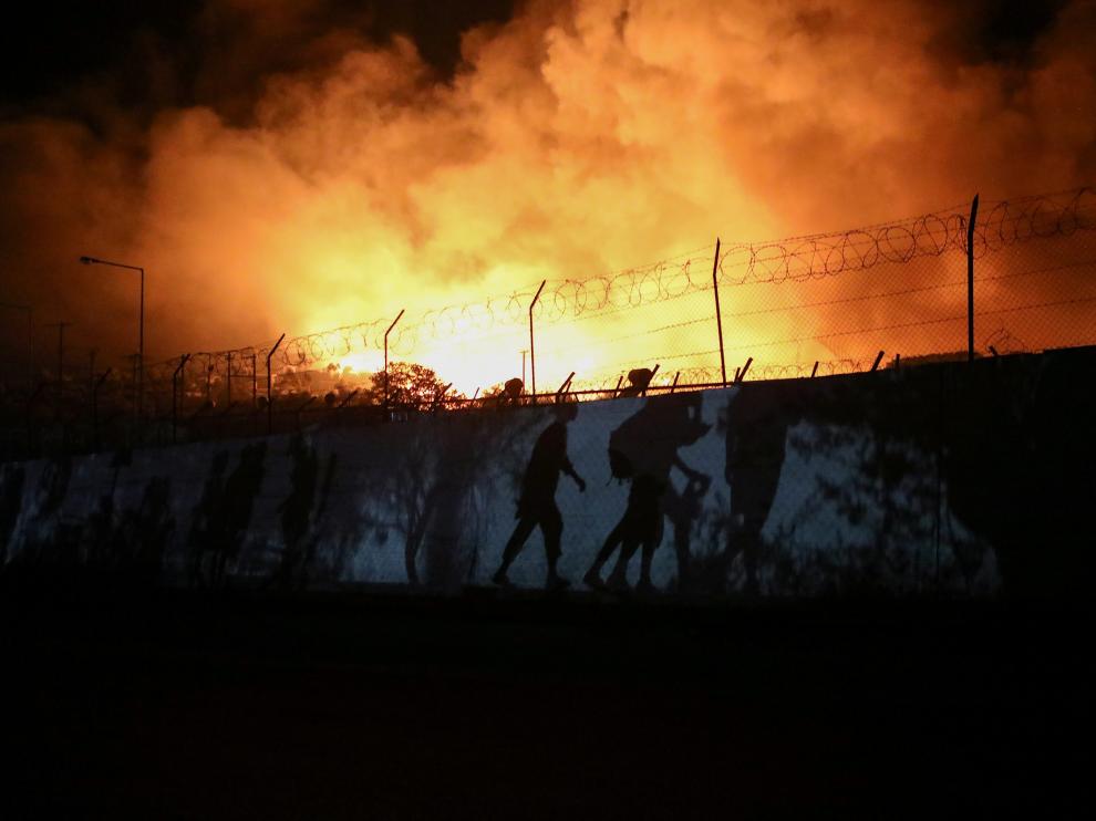 Fire burns at the Moria camp for refugees and migrants on the island of Lesbos