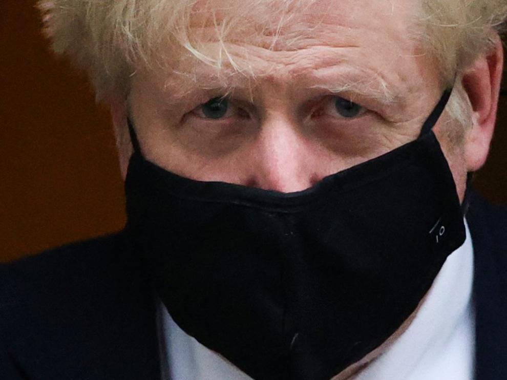 Britain's Prime Minister Boris Johnson leaves Downing Street, in London