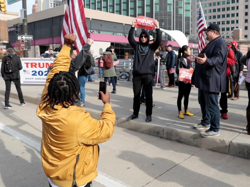 Supporters of U.S. President Donald Trump protest outside the TCF Center, in Detroit