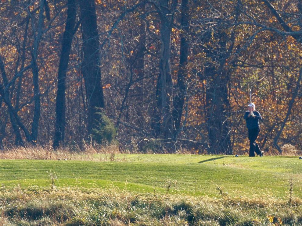 U.S. President Donald Trump plays golf at the Trump National Golf course in Virginia