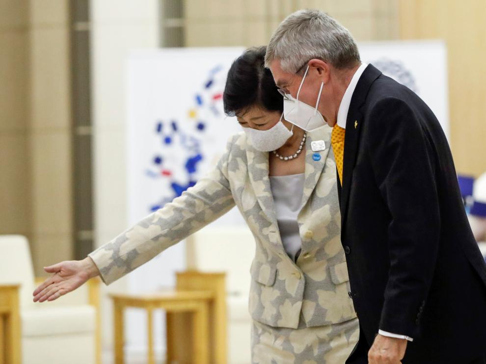 Thomas Bach, President of the International Olympic Committee (IOC), is accompanied by Tokyo Governor Yuriko Koike at the start of their talks at Tokyo Metropolitan Government Office Building in Tokyo