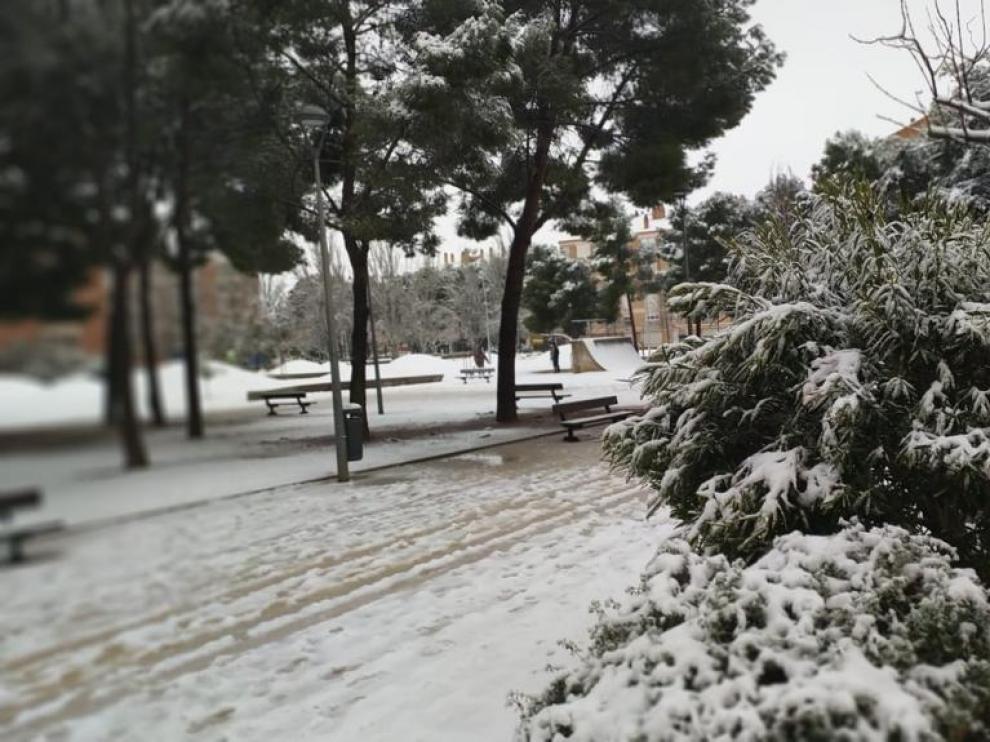 La nieve se acumula en las copas. En la imagen, el parque de San Martín este domingo.