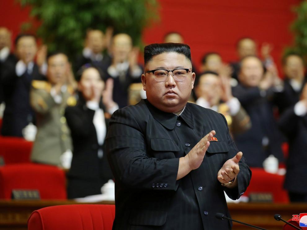 North Korean leader Kim Jong Un applauds at the 8th Congress of the Workers' Party in Pyongyang