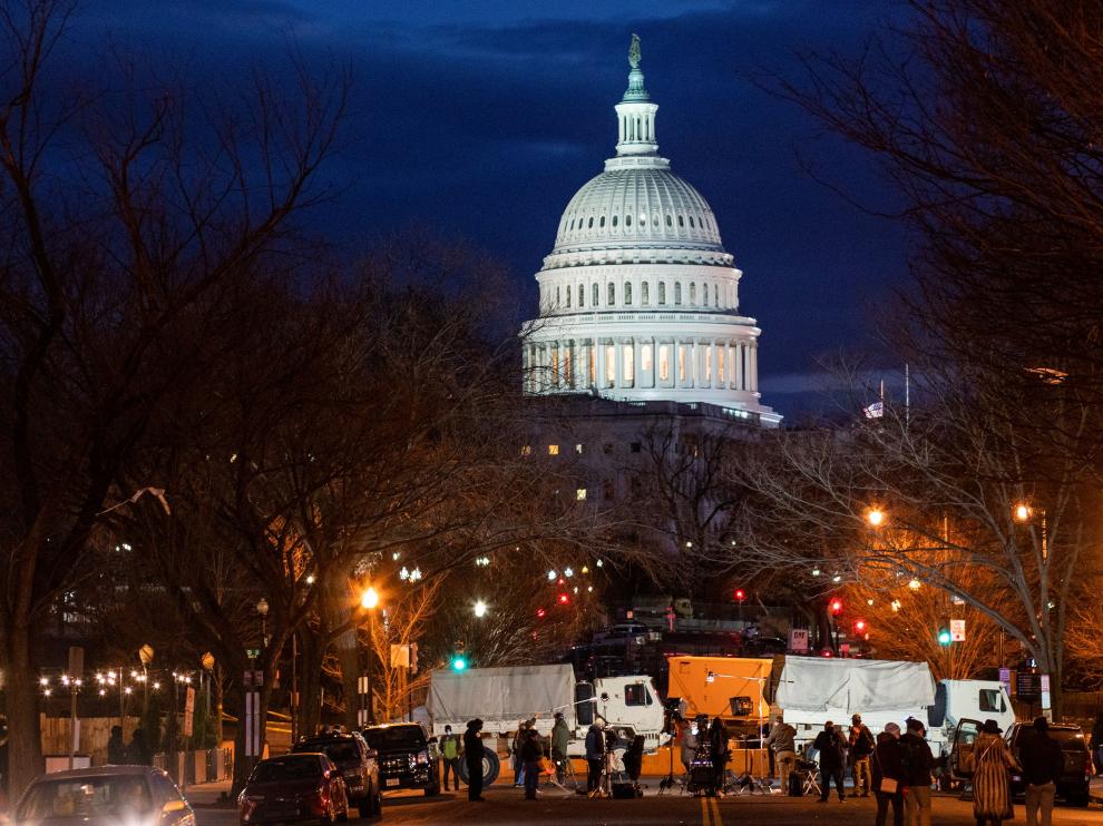 Members of the media are seen near the Capitol ahead of U.S. President-elect Biden's inauguration in Washington