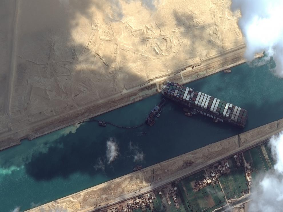 Ever Given container ship is pictured in Suez Canal in this Maxar Technologies satellite image taken on March 26, 2021. Maxar Technologies/Handout via REUTERS ATTENTION EDITORS - THIS IMAGE HAS BEEN SUPPLIED BY A THIRD PARTY. MANDATORY CREDIT. NO RESALES. NO ARCHIVES. DO NOT OBSCURE LOGO.?[[[REUTERS VOCENTO]]] EGYPT-SUEZCANAL/SHIP