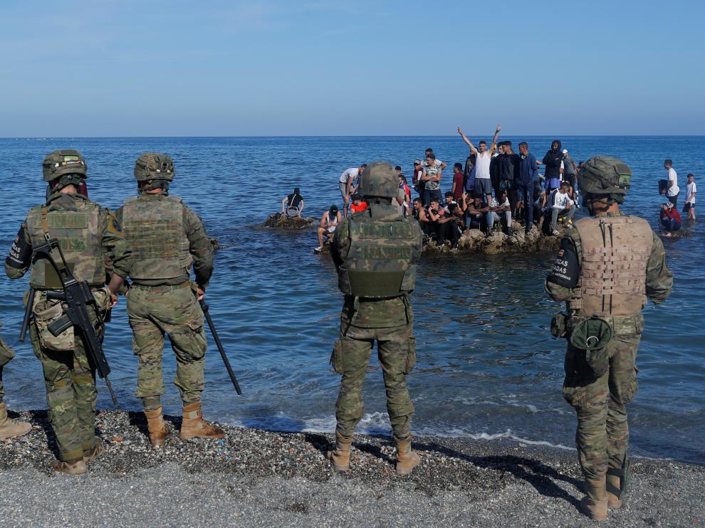 Thousands of migrants cross the Spanish-Moroccan border