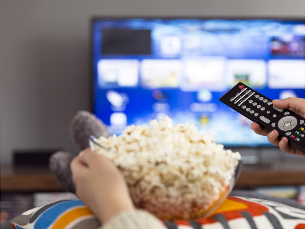 young woman watching tv