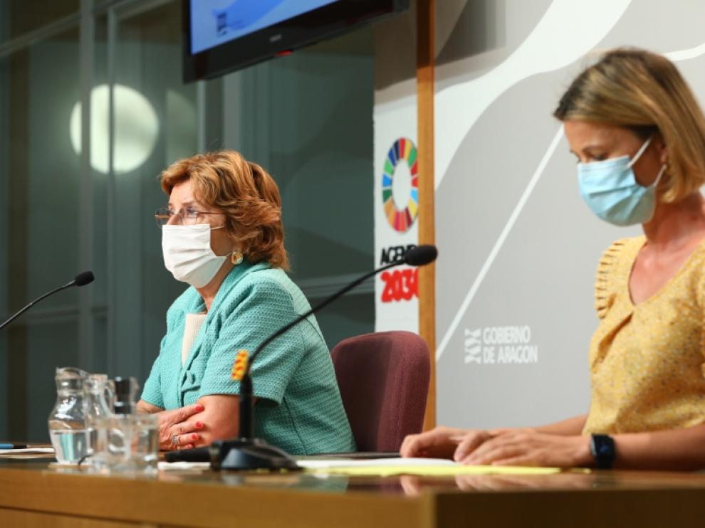 María Victoria Broto y Noelia Carbó este martes en la rueda de prensa de presentación del balance de atención a las personas en situación de dependencia