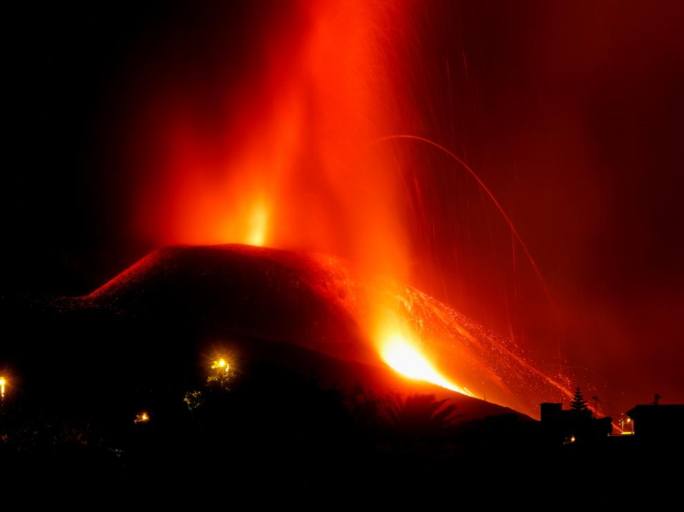 Lava and smoke rise following the eruption of a volcano on the Canary Island of La Palma