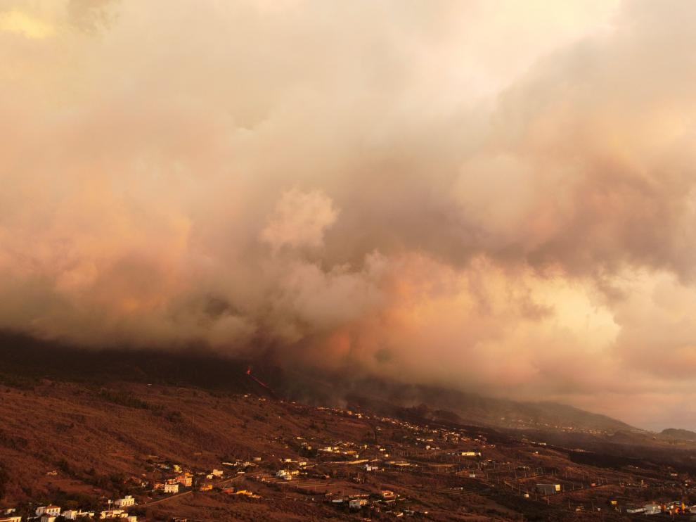 Smoke rises following the eruption of a volcano in Tajuya, on the Canary Island of La Palma