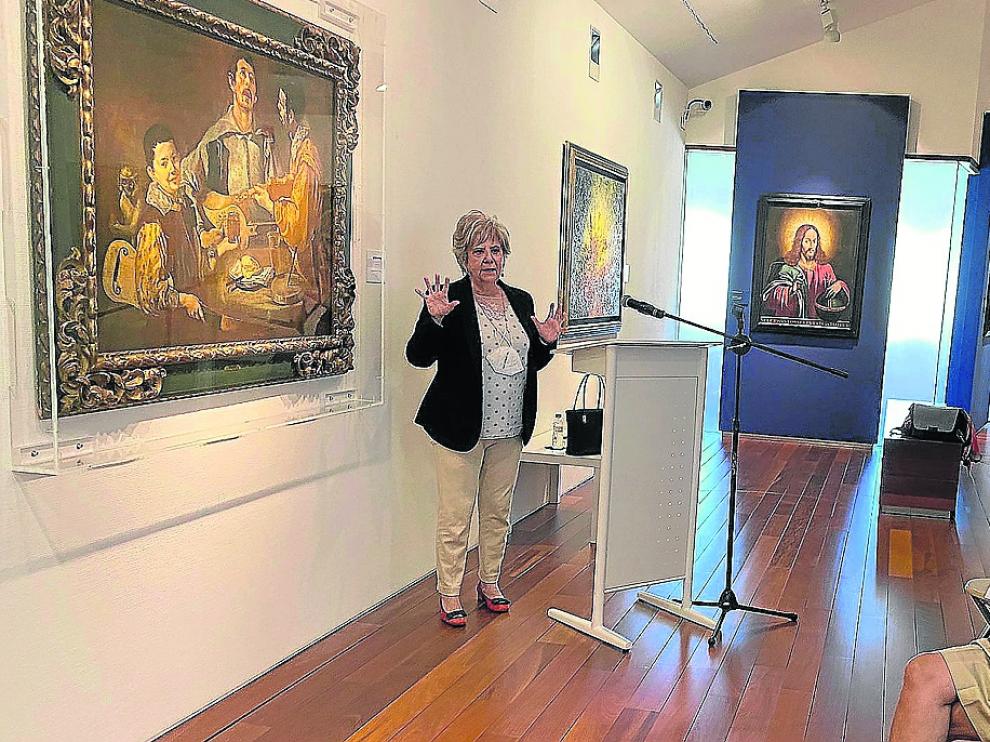 La catedrática de Historia del Arte, Carmen Morte, durante la charla general 'Tres Músicos'.