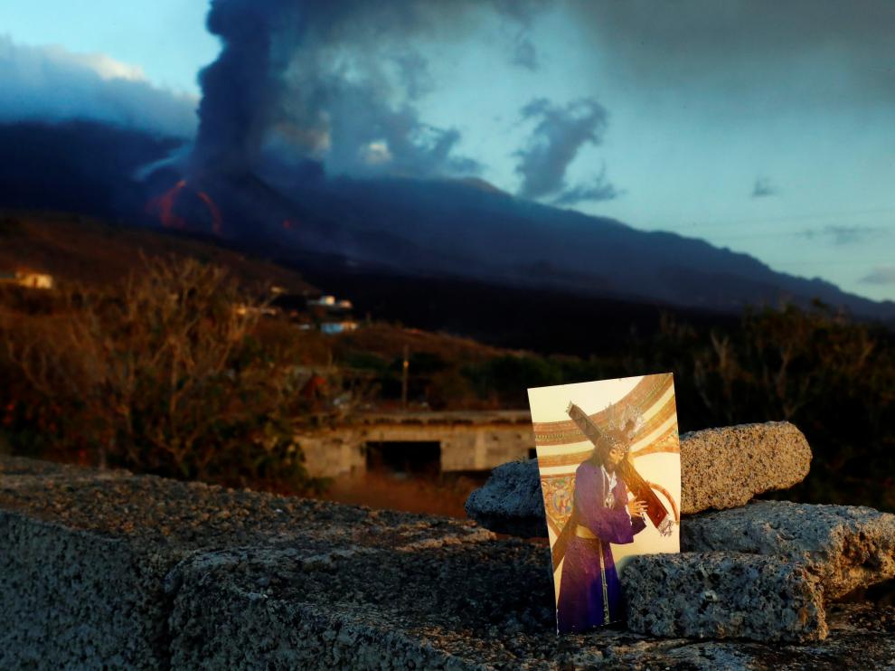 A picture of Jesus Nazareno is placed near the Cumbre Vieja volcano as seen from El Paso