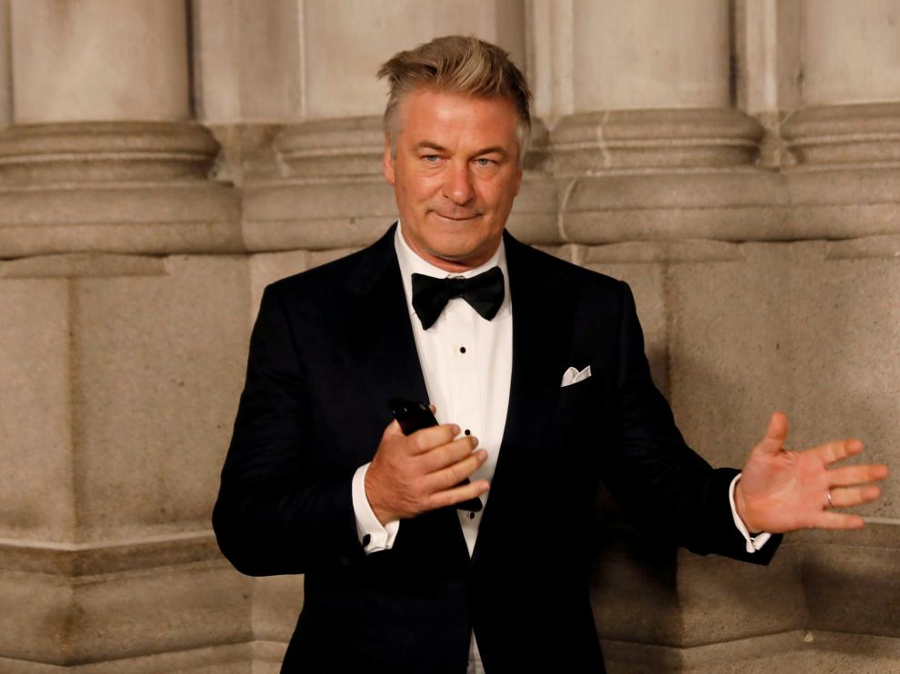 FILE PHOTO: Actor Alec Baldwin gestures before walking on the red carpet during the commemoration of the Elton John AIDS Foundation 25th year fall gala at the Cathedral of St. John the Divine in New York City