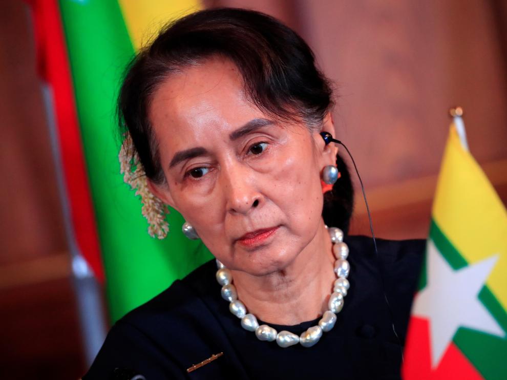 Aung San Suu Kyi and Win Myint sentenced to four years in prison