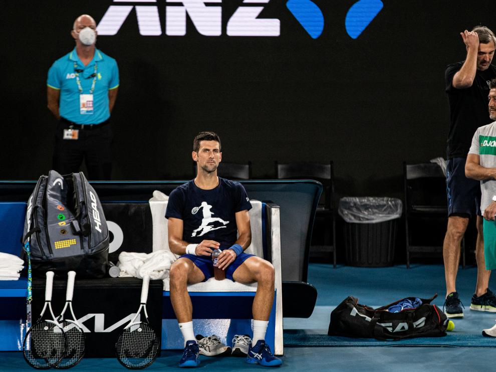 Serbian tennis player Novak Djokovic rests during a training session at Melbourne Park