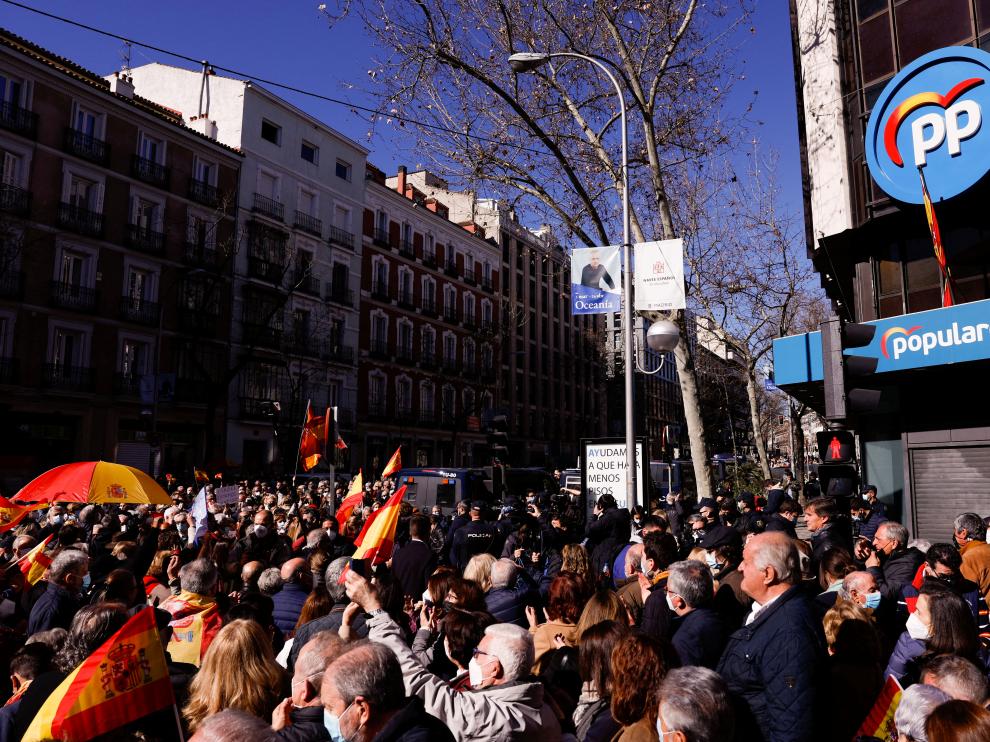 Spain's opposition People's Party (PP) supporters gather at headquarters