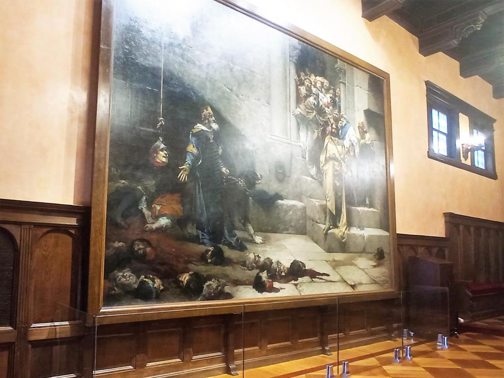 Pantalla de vidrio colocada delante del cuadro 'La Campana de Huesca', en el Salón del Justicia.