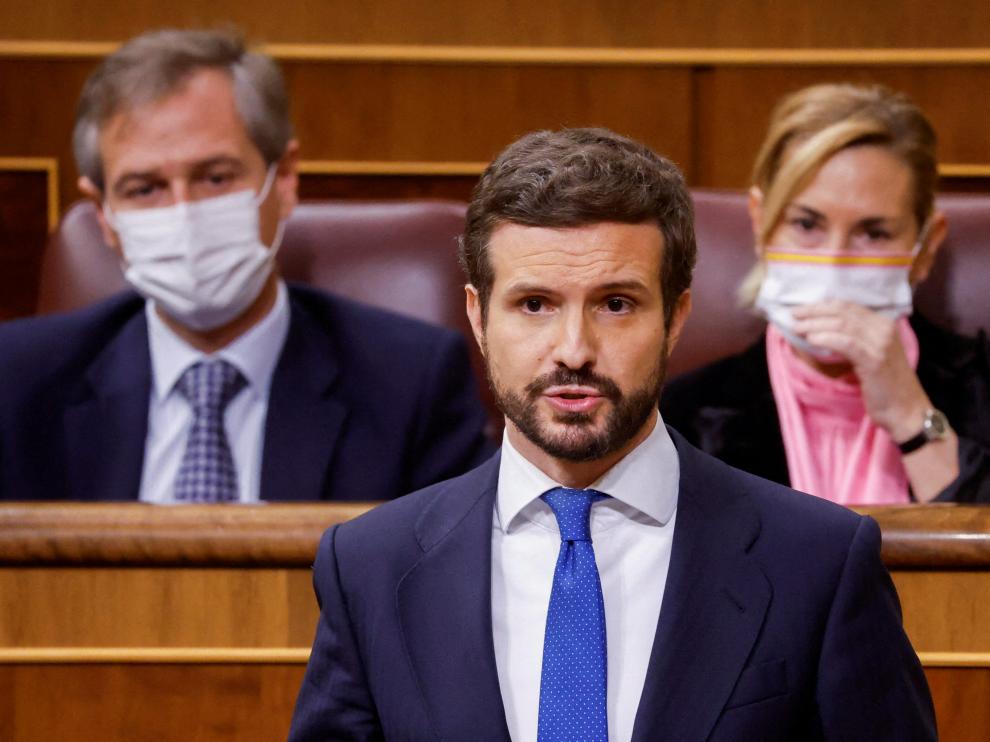 Pablo Casado, leader of Popular Party (PP) is applauded during a session at the Parliament, in Madrid, Spain, Februray 23, 2022. REUTERS/Juan Medina SPAIN-POLITICS/OPPOSITION