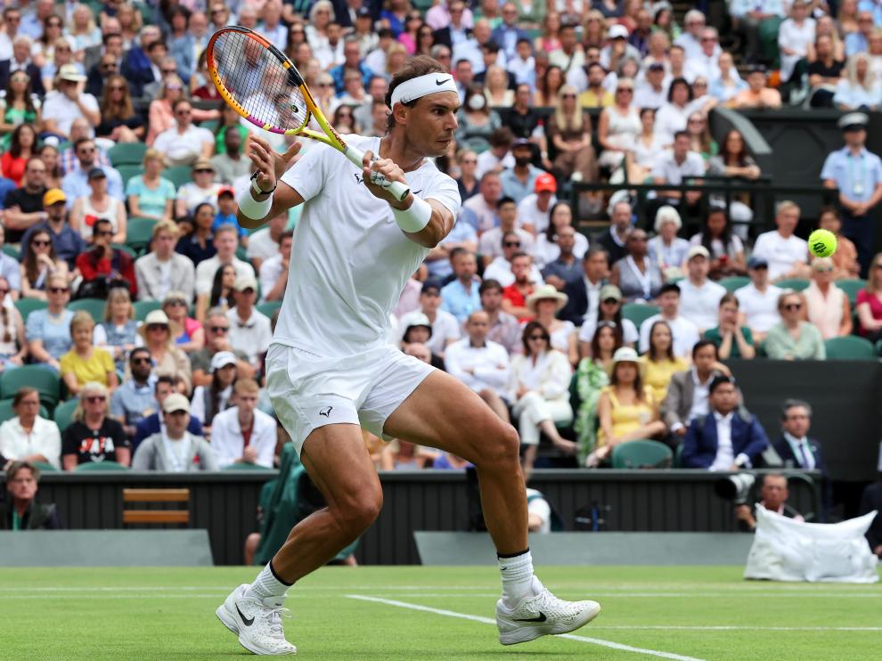 Tennis - Wimbledon - All England Lawn Tennis and Croquet Club, London, Britain - July 6, 2022 Spain's Rafael Nadal reacts during his quarter final match against Taylor Fritz of the U.S. REUTERS/Hannah Mckay TENNIS-WIMBLEDON/