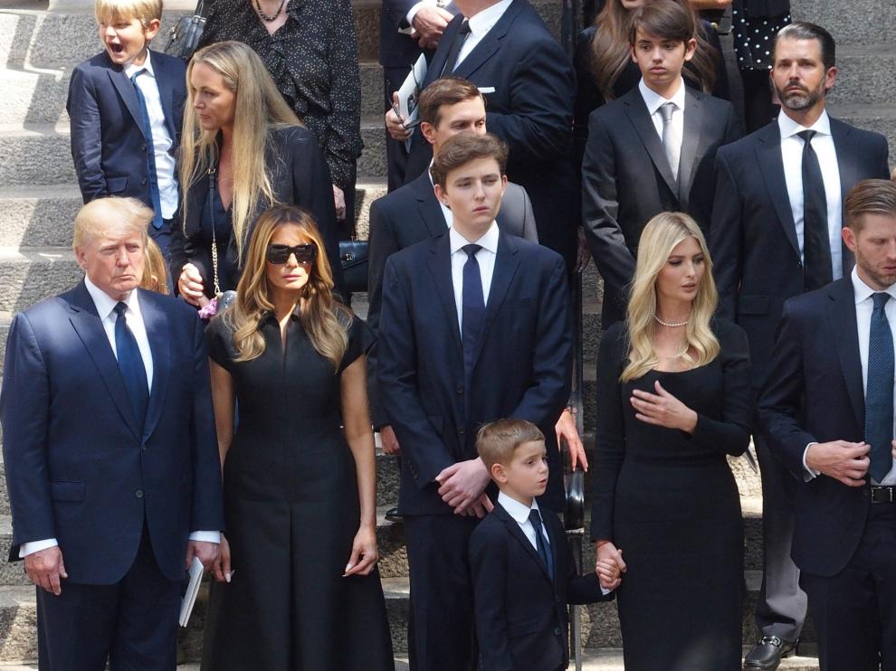 Former U.S. President Donald Trump with his wife Melania, daughter Ivanka and son Donald Jr. attend the funeral for Ivana Trump, socialite and his first wife, in New York City, U.S., July 20, 2022. REUTERS/Jeenah Moon PEOPLE-IVANA TRUMP/FUNERAL