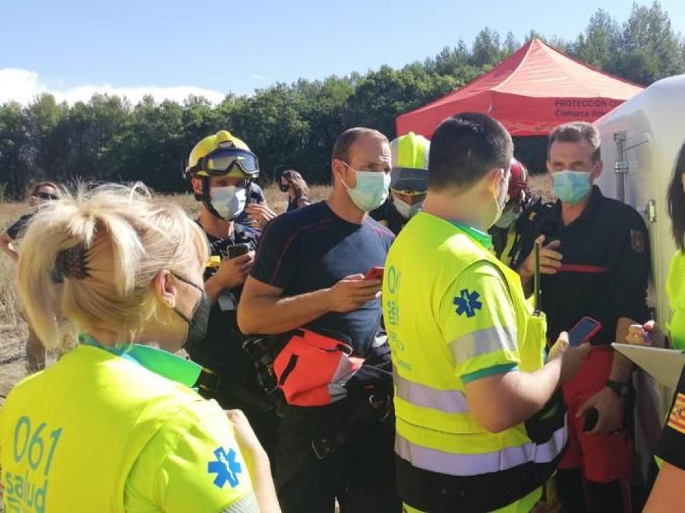 Reunión entre los sanitarios y los bomberos.