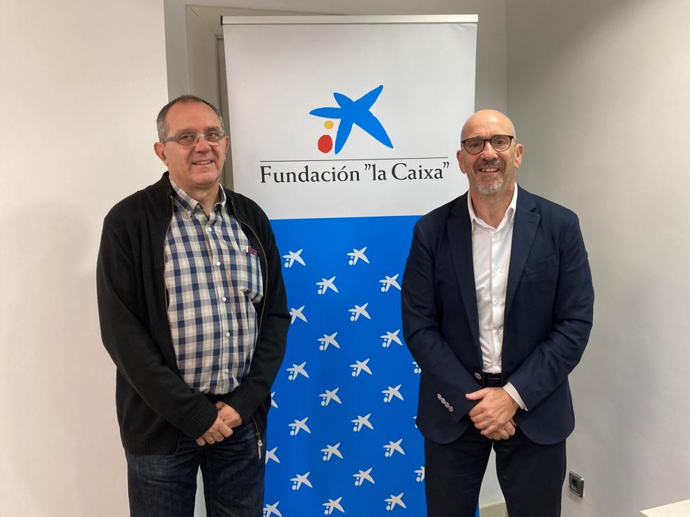 Francisco Ratia, de Aspace Huesca, y Javier L. Muñoz, de Caixabank.