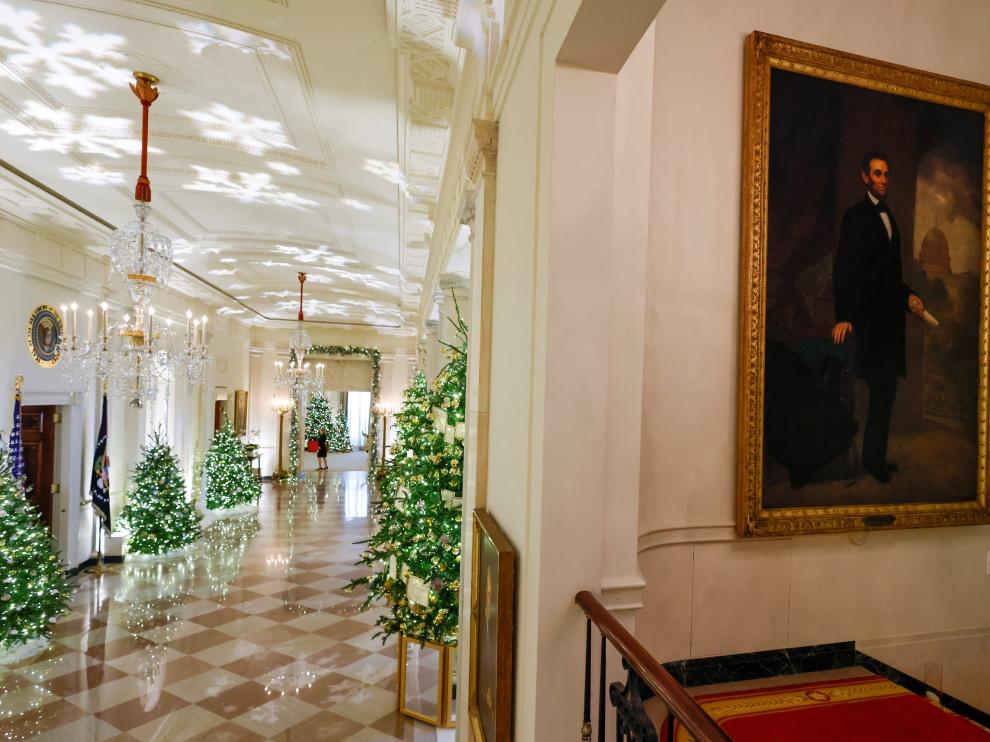 Biden family stockings hang from the mantel among Christmas decorations on the theme "We the People" in the State Dining Room as they are unveiled during a press tour ahead of holiday receptions by U.S. President Joe Biden and first lady Jill Biden, at the White House in Washington, D.C., U.S. November 28, 2022. REUTERS/Jonathan Ernst CHRISTMAS-SEASON/WHITEHOUSE