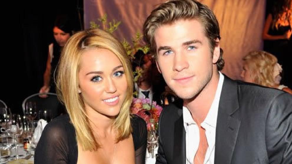 Miley Cyrus, junto a su prometido, Liam Hemsworth.