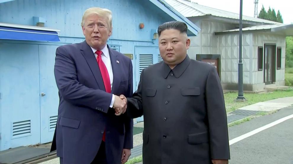 U.S. President Donald Trump meets with North Korean leader Kim Jong Un at the demilitarised zone (DMZ) separating the two Koreas, in Panmunjom, South Korea, in this still image from video taken June 30, 2019. U.S. Network Pool/via REUTERS TV UNITED STATES OUT. NO COMMERCIAL OR EDITORIAL SALES IN UNITED STATES. BROADCAST: NO USE USA. US DIGITAL CUSTOMERS: NO USE USA. NON US DIGITAL CUSTOMERS: NO USE IN BROADCASTS. NO USE BY AUSTRALIA BROADCASTERS. [[[REUTERS VOCENTO]]] NORTHKOREA-USA/SOUTHKOREA
