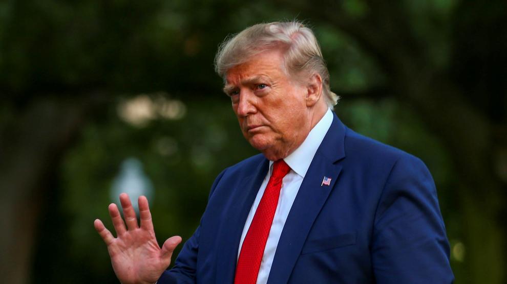 FILE PHOTO: U.S. President Donald Trump returns after travelling to the AMVETS convention in Kentucky, at the South Lawn of the White House in Washington, U.S. August 21, 2019. REUTERS/Tasos Katopodis/File Photo [[[REUTERS VOCENTO]]] USA-TRUMP/EMOLUMENTS
