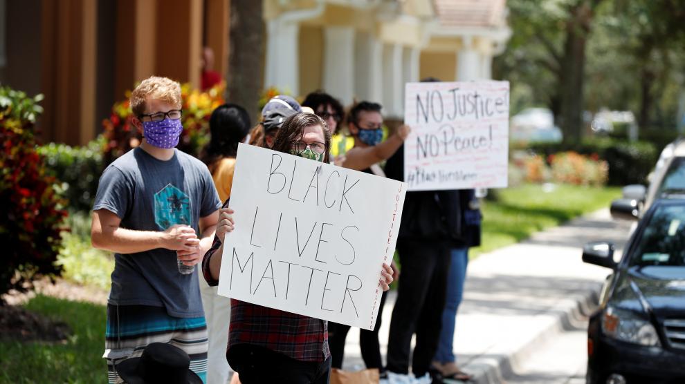 Protesters gather outside the Florida home of former Minneapolis police officer Derek Chauvin, in Orlando