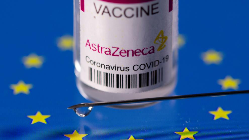 FILE PHOTO: Vial labelled "AstraZeneca coronavirus disease (COVID-19) vaccine" placed on displayed EU flag is seen in this illustration picture