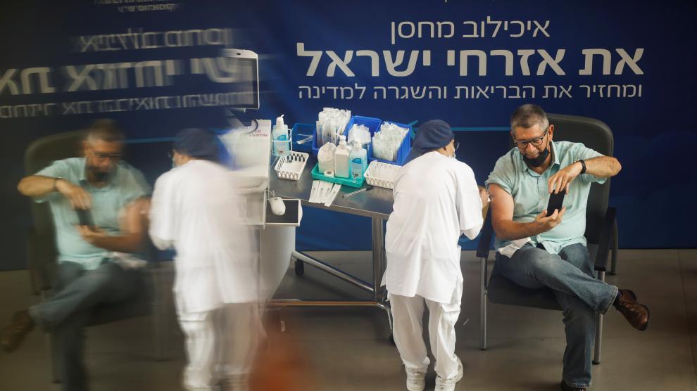 A man receives his third dose of a coronavirus disease (COVID-19) vaccine at Sourasky Medical Center (Ichilov Hospital) in Tel Aviv