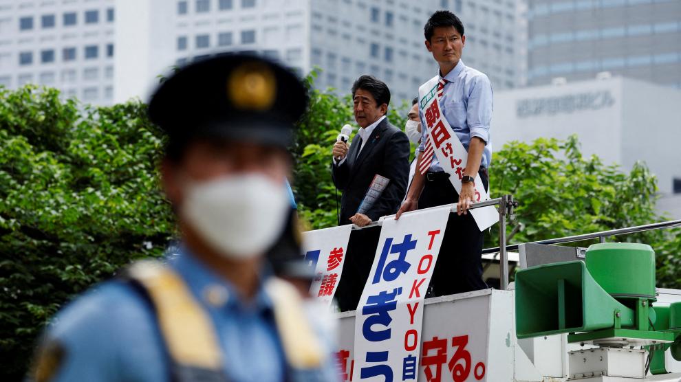 FILE PHOTO: Former Japanese PM Abe delivers a speech during an election campaign for the upcoming Upper House election in Tokyo