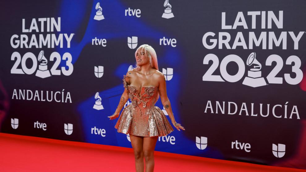 3. Karol G's blue hair and denim outfit at the 2019 Latin Grammy Awards - wide 3
